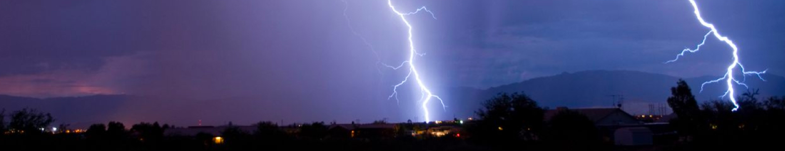 Lightning strikes hit the ground during a storm
